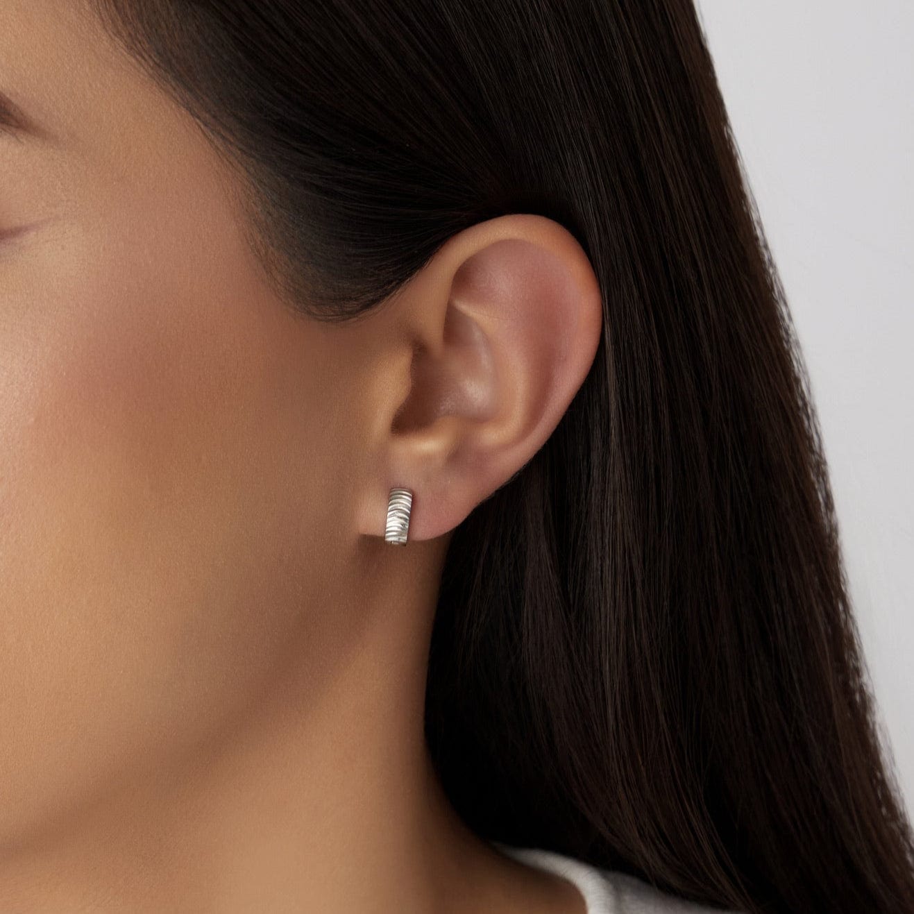 Urbanti Stainless Steel Aimee Huggie Hoop Earrings