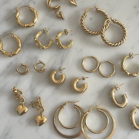 Urbanti Stainless Steel Criss Cross Hoop Earrings