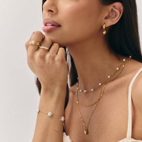 Urbanti Stainless Steel Puffy Heart Hoop Earrings